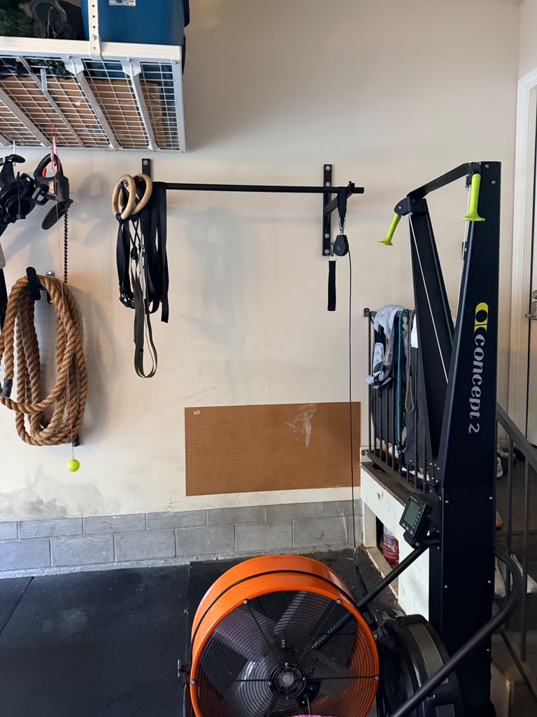 Gymnastic rings, climbing rope, pull-up bar and a Concept2 rower